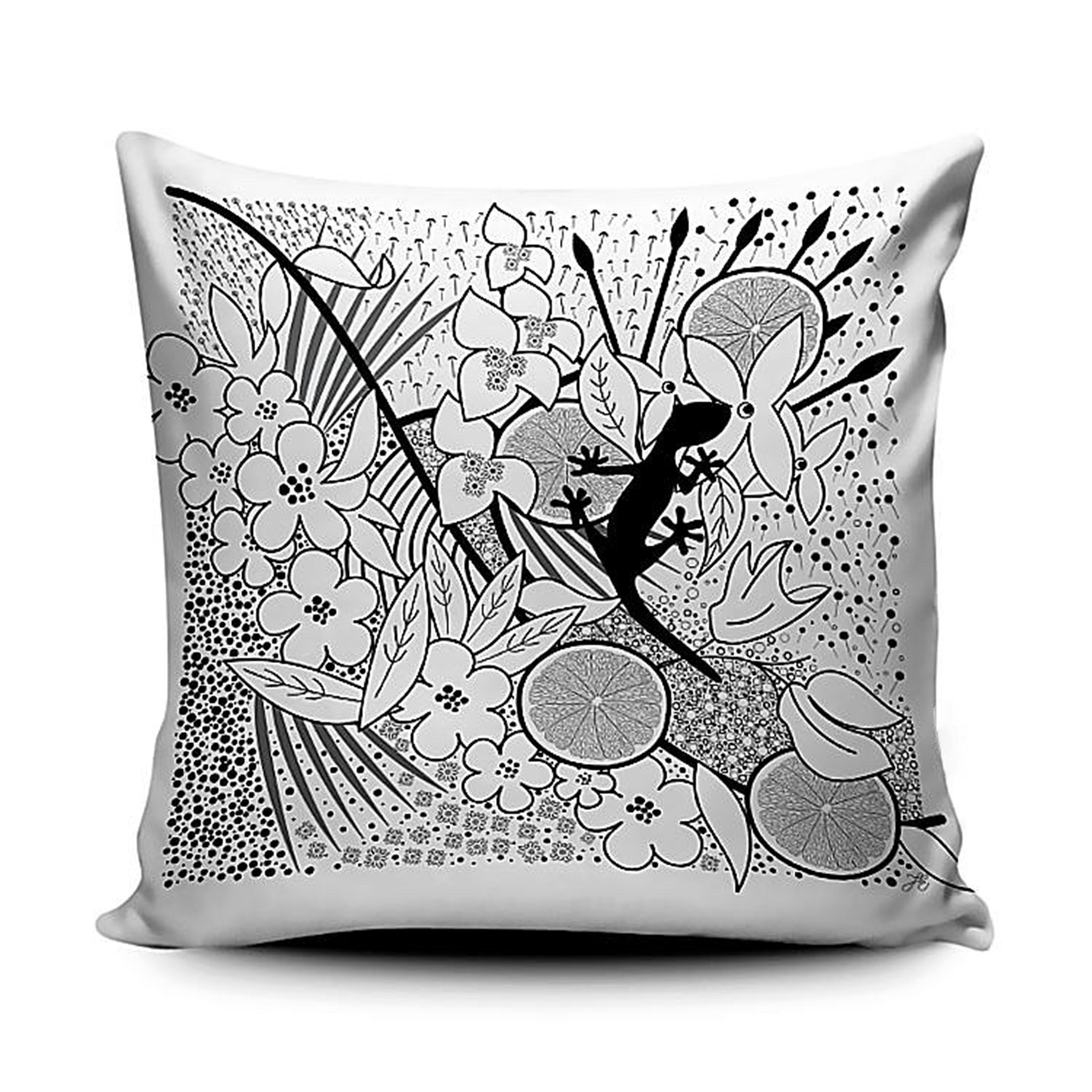 A white cushion with a black tropical pattern.  The pattern consists of palm tree leaves, tropical flowers, circular grapefruits slices , with patterns created from parts of flowers in the background.  The central focal point is a gecko in solid black sat amongst the detail.